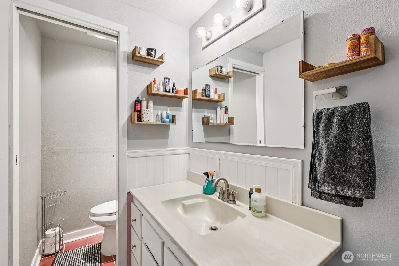 29 Maple Court Bellingham, WA 98229 - Photo 18 of 39 a bathroom with a sink vanity and toilet