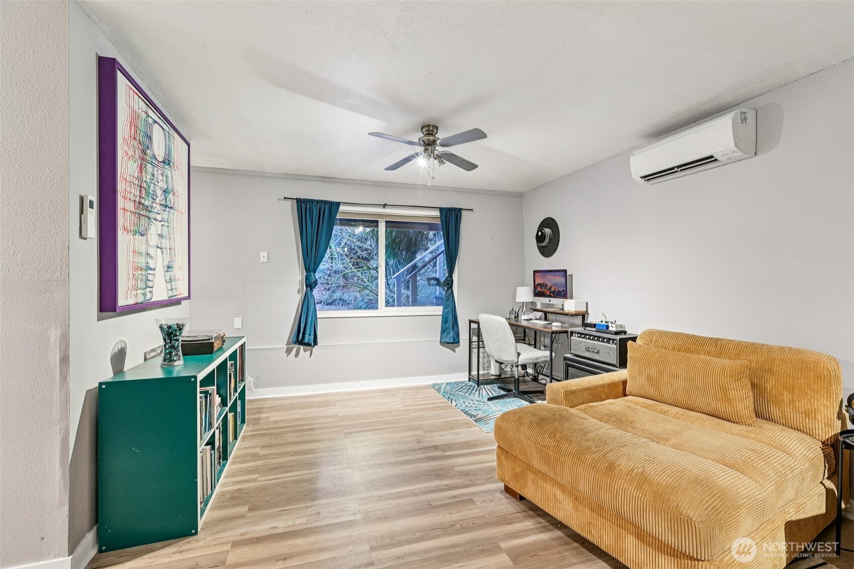 29 Maple Court Bellingham, WA 98229 - Photo 21 of 39 a living room with furniture and a wooden floor