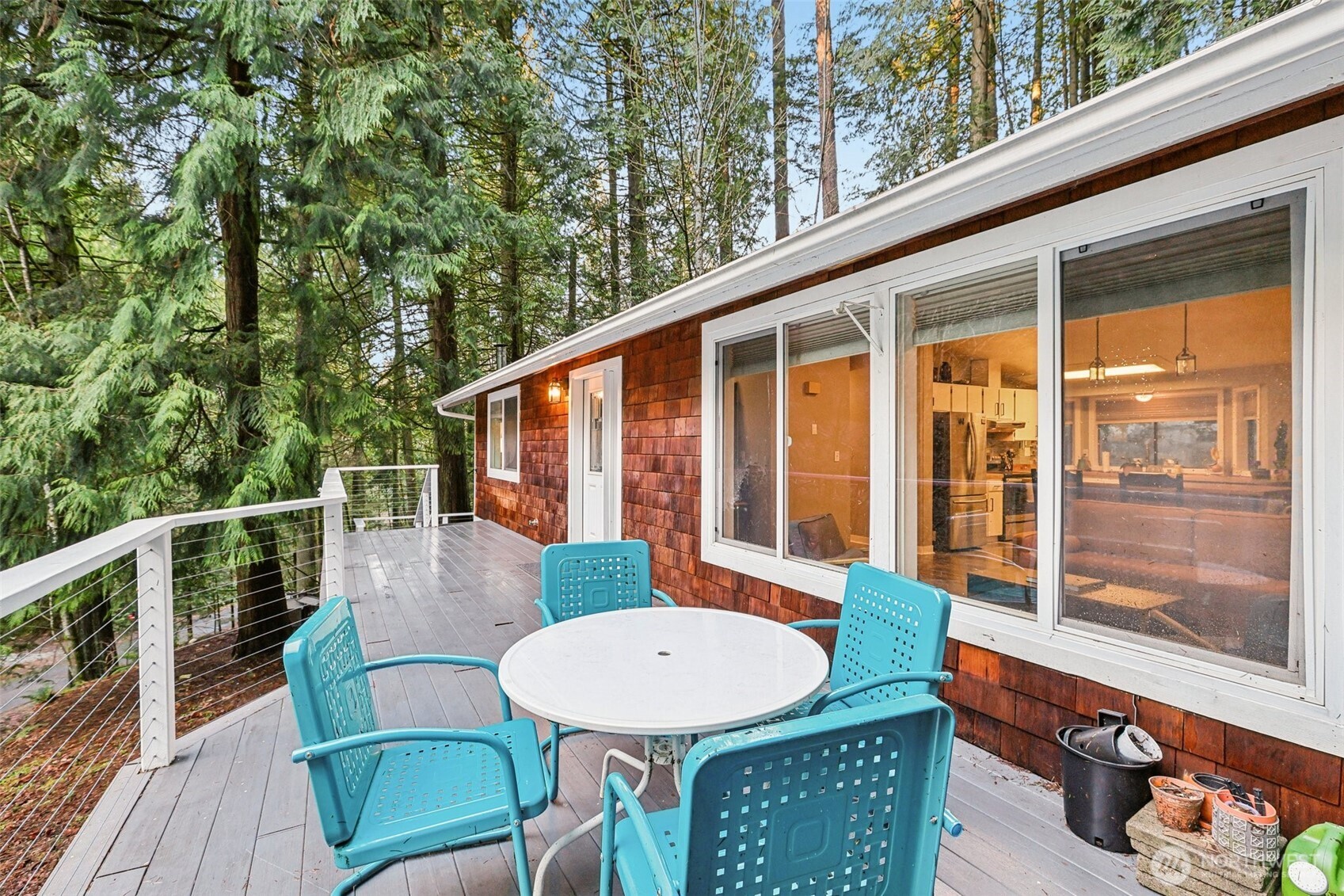 29 Maple Court Bellingham, WA 98229 - Photo 37 of 39 a view of a balcony with a table and chairs