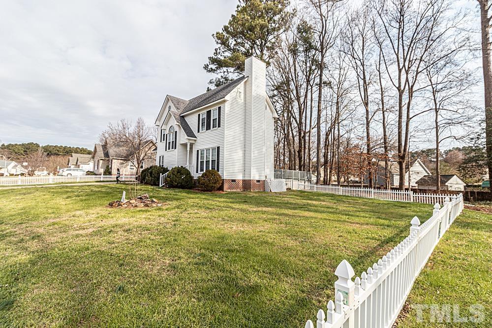 1875 Forest Wood Road Rocky Mount, NC 27804 - Photo 12 of 17 a view of a swimming pool with a house in the background