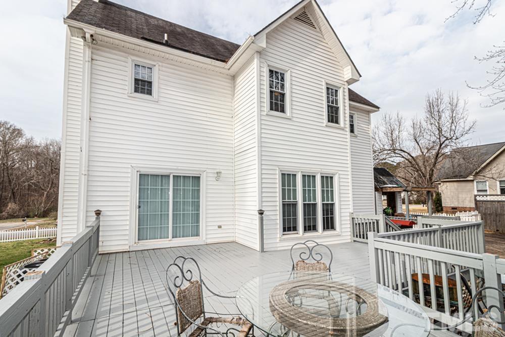 1875 Forest Wood Road Rocky Mount, NC 27804 - Photo 14 of 17 a view of a house with backyard and sitting area