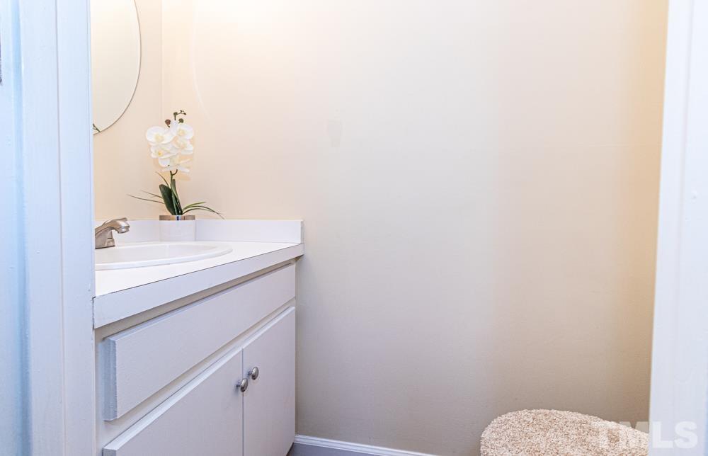 1875 Forest Wood Road Rocky Mount, NC 27804 - Photo 16 of 17 a bathroom with a sink and vanity