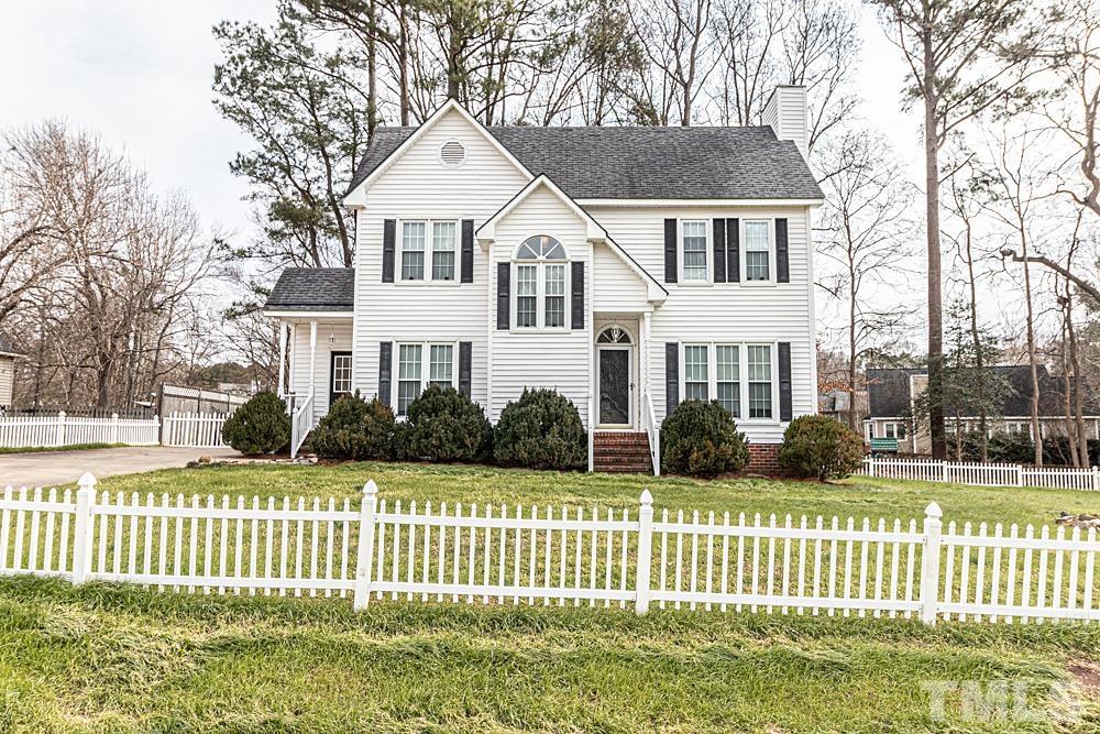 1875 Forest Wood Road Rocky Mount, NC 27804 - Photo 17 of 17 a front view of a house with a garden and plants