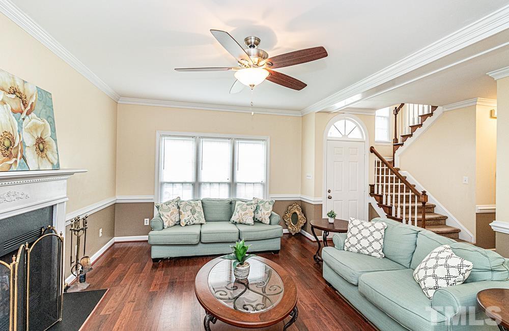 1875 Forest Wood Road Rocky Mount, NC 27804 - Photo 2 of 17 a living room with furniture and a large window