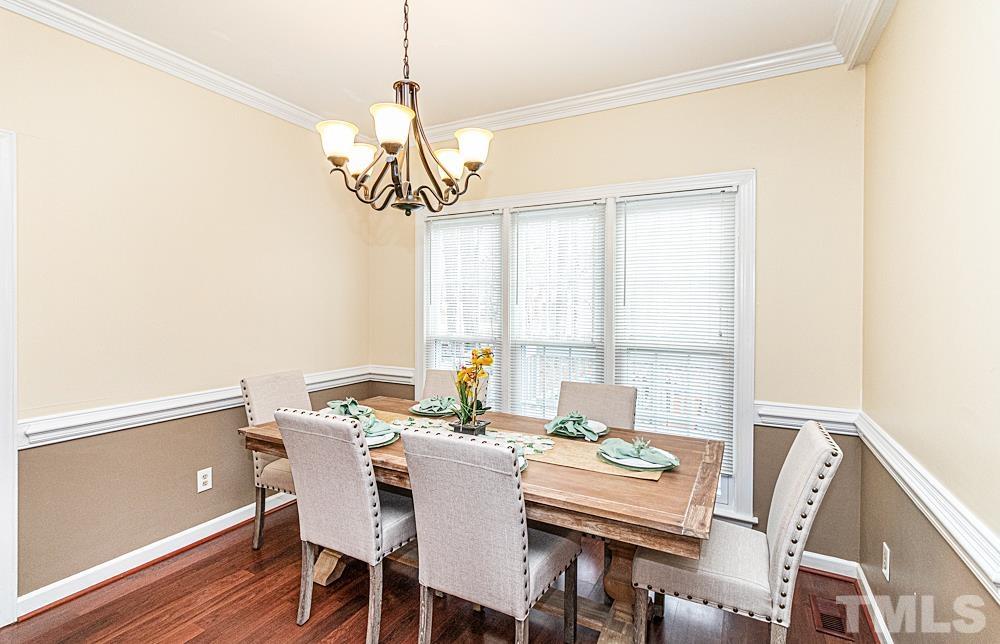 1875 Forest Wood Road Rocky Mount, NC 27804 - Photo 4 of 17 a view of a dining room with furniture window and outside view