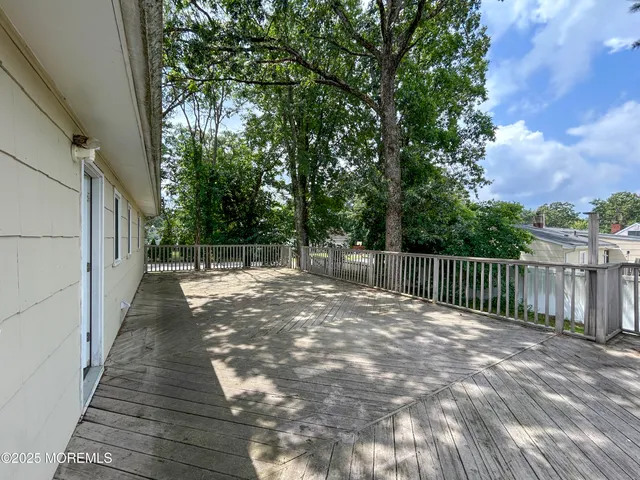 a view of backyard with green space