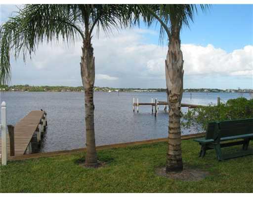 1979 Southwest Palm City Road, Unit 41B Stuart, FL 34994 - Photo 5 of 14 a view of a garden and lake