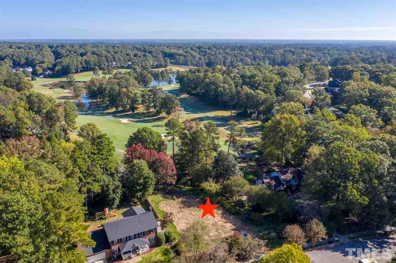 6908 Tanbark Way Raleigh, NC 27615 - Photo 6 of 10 an aerial view of residential house with outdoor space and swimming pool