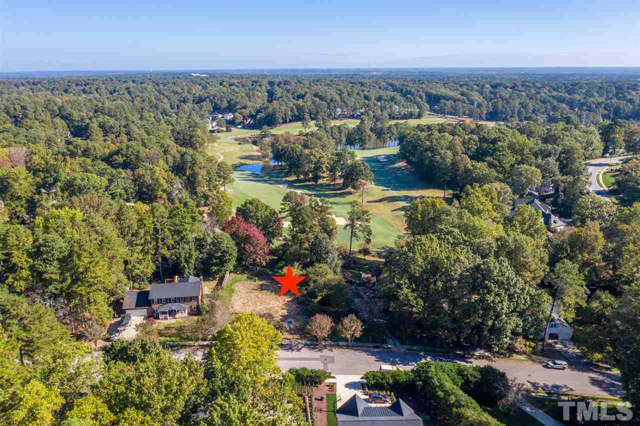 6908 Tanbark Way Raleigh, NC 27615 - Photo 7 of 10 an aerial view of residential house with outdoor space