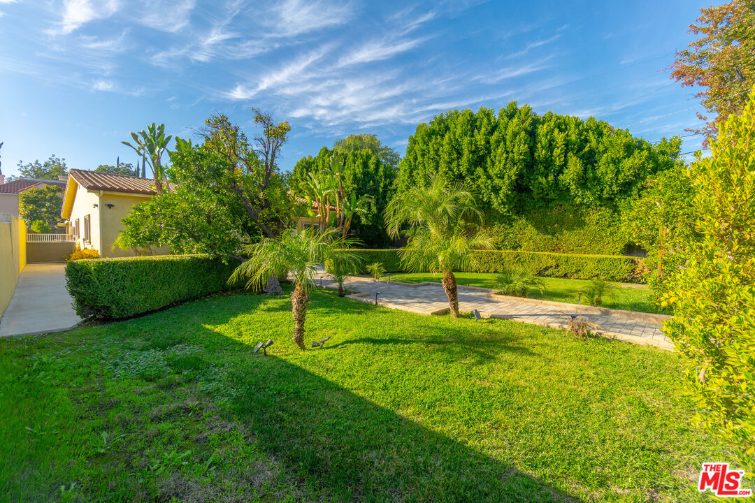 5181 Densmore Avenue Encino, CA 91436 - Photo 1 of 73 a view of a garden with a slide