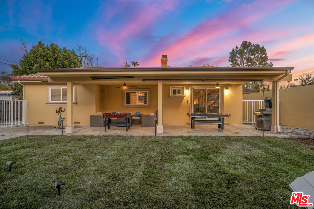5181 Densmore Avenue Encino, CA 91436 - Photo 31 of 73 a front view of a house with garden