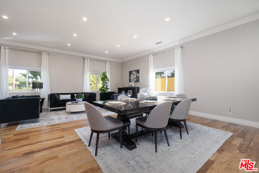 5181 Densmore Avenue Encino, CA 91436 - Photo 10 of 73 a view of a dining room with furniture