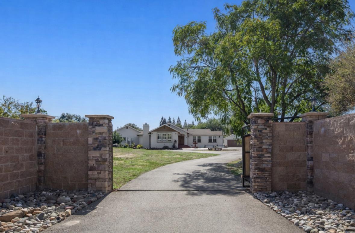 5852 Olive Ranch Road Granite Bay, CA 95746 - Photo 1 of 46 a view of a house with a yard