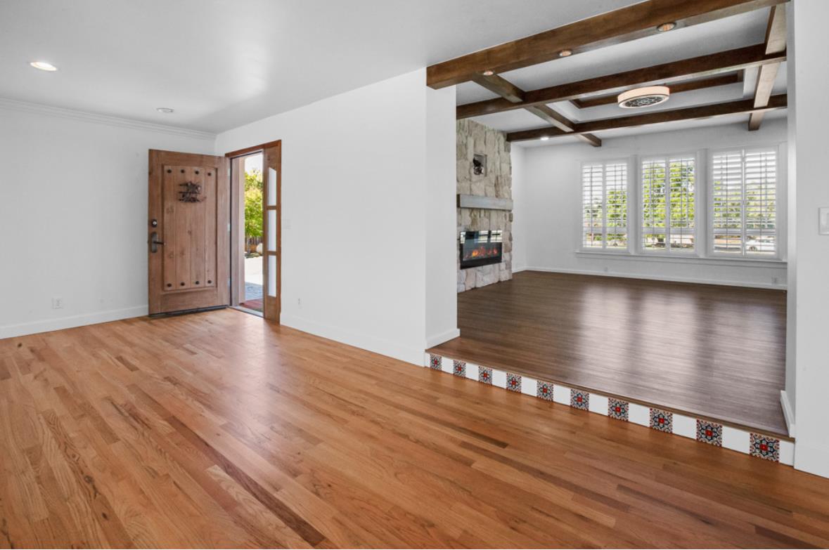 5852 Olive Ranch Road Granite Bay, CA 95746 - Photo 19 of 46 a view of an empty room with wooden floor and a window