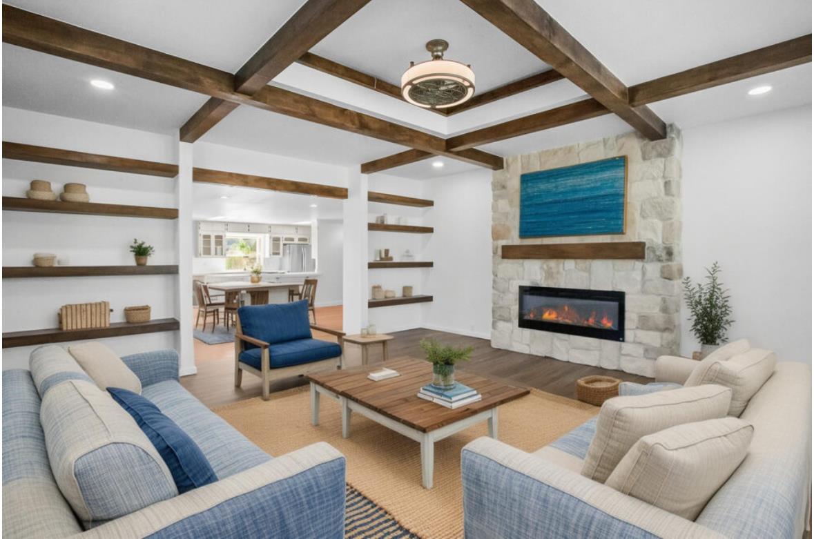 5852 Olive Ranch Road Granite Bay, CA 95746 - Photo 24 of 46 a living room with furniture and a fireplace