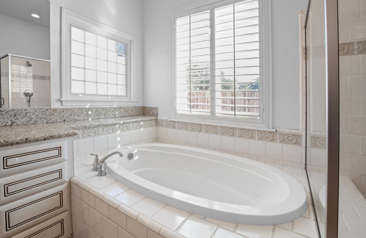 5852 Olive Ranch Road Granite Bay, CA 95746 - Photo 29 of 46 a white bath tub sitting next to a window
