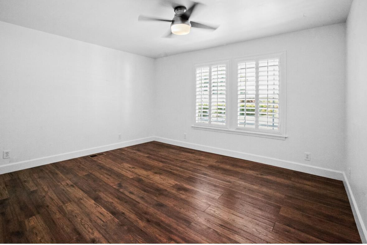 5852 Olive Ranch Road Granite Bay, CA 95746 - Photo 32 of 46 wooden floor in an empty room with a window