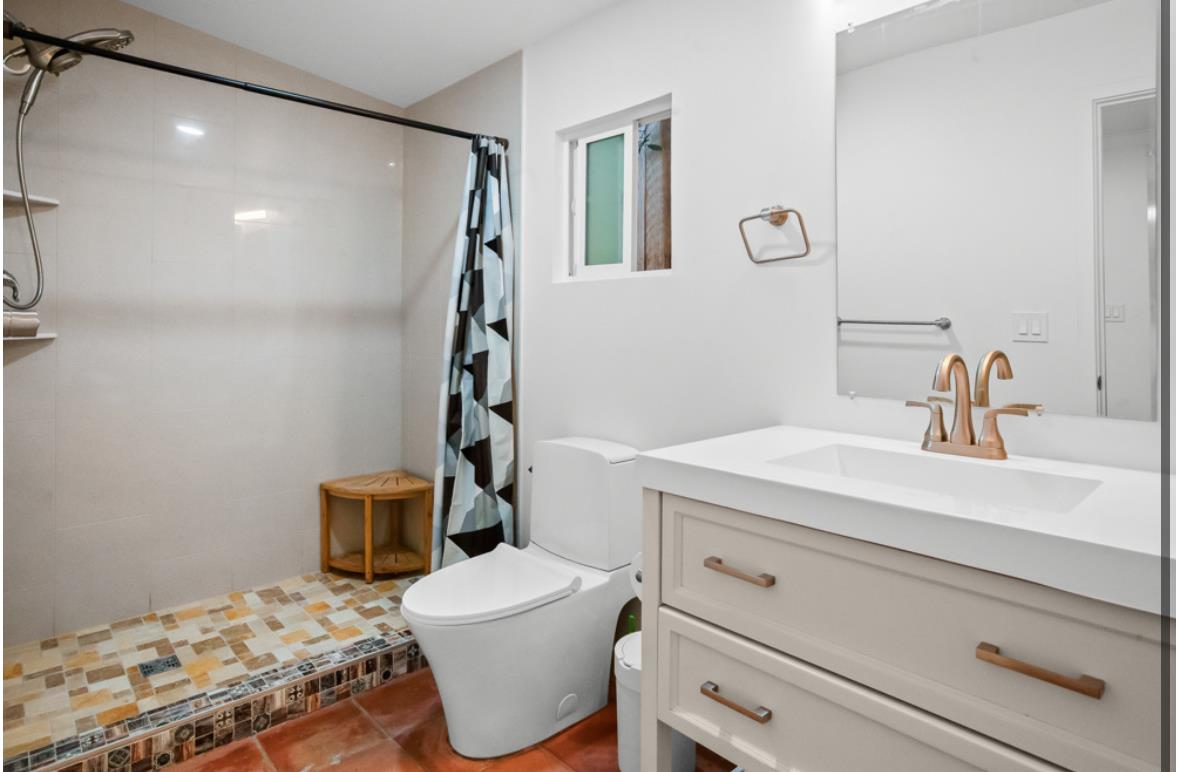 5852 Olive Ranch Road Granite Bay, CA 95746 - Photo 39 of 46 a bathroom with a sink toilet and shower