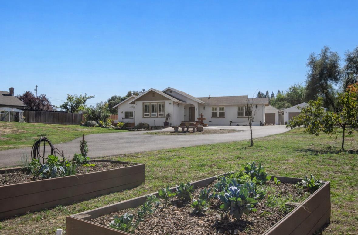 5852 Olive Ranch Road Granite Bay, CA 95746 - Photo 7 of 46 a house view with a garden space