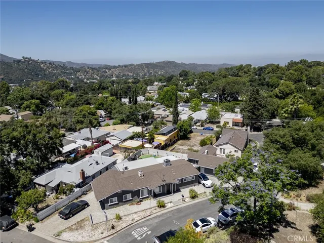 an aerial view of a city with lots of residential buildings