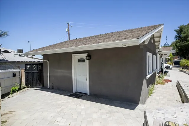 a view of a house with a patio
