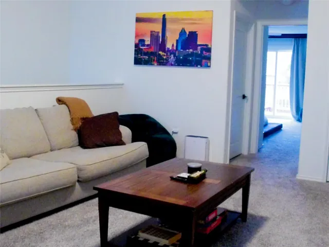 a living room with furniture and a couch