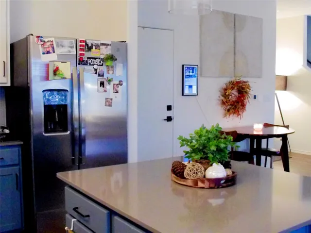 a view of a house with a backyard porch and sitting area