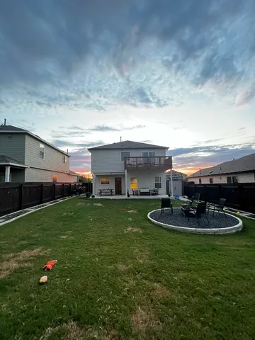 a room with furniture and a potted plant