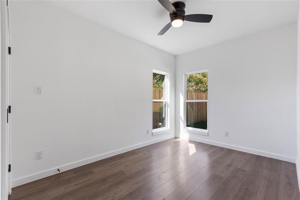 2535 Exline Street Dallas, TX 75215 - Photo 33 of 38 wooden floor in an empty room with a window