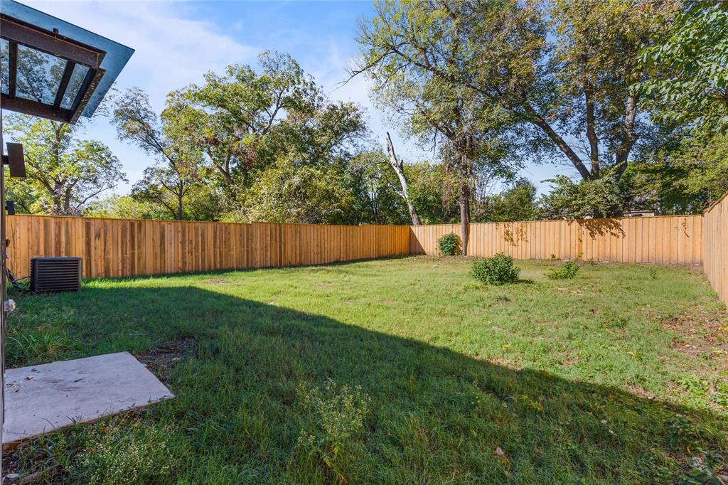 2535 Exline Street Dallas, TX 75215 - Photo 38 of 38 a view of a backyard with large tree