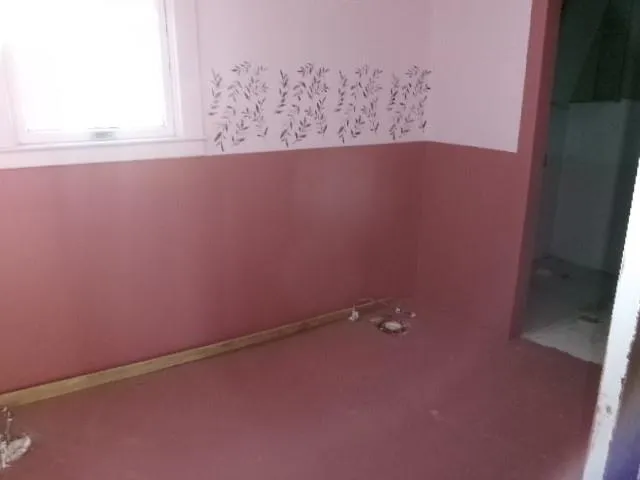 an empty room with a window