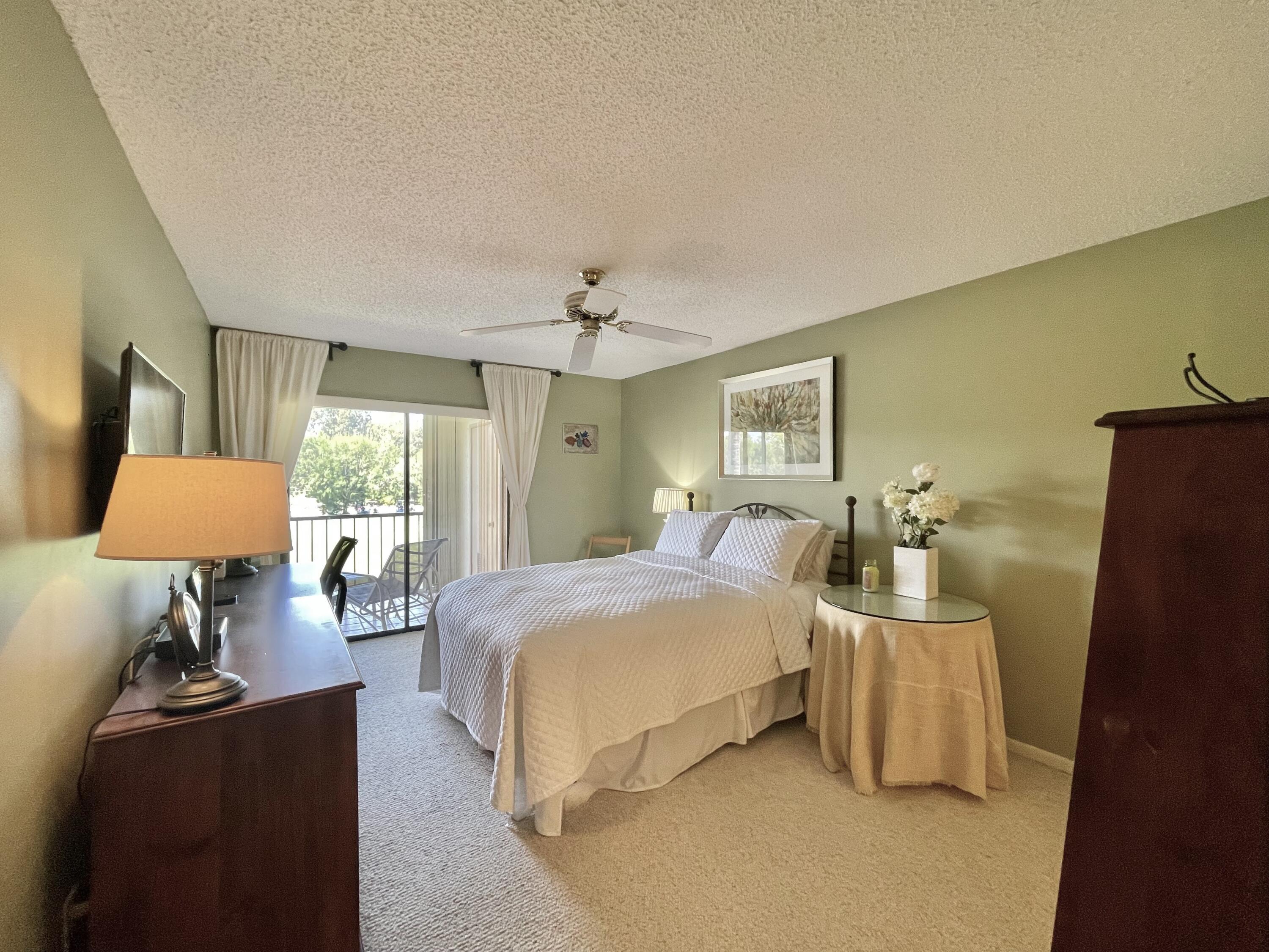 402 Pinecrest Circle, Unit B Jupiter, FL 33458 - Photo 25 of 45 Master Bedroom