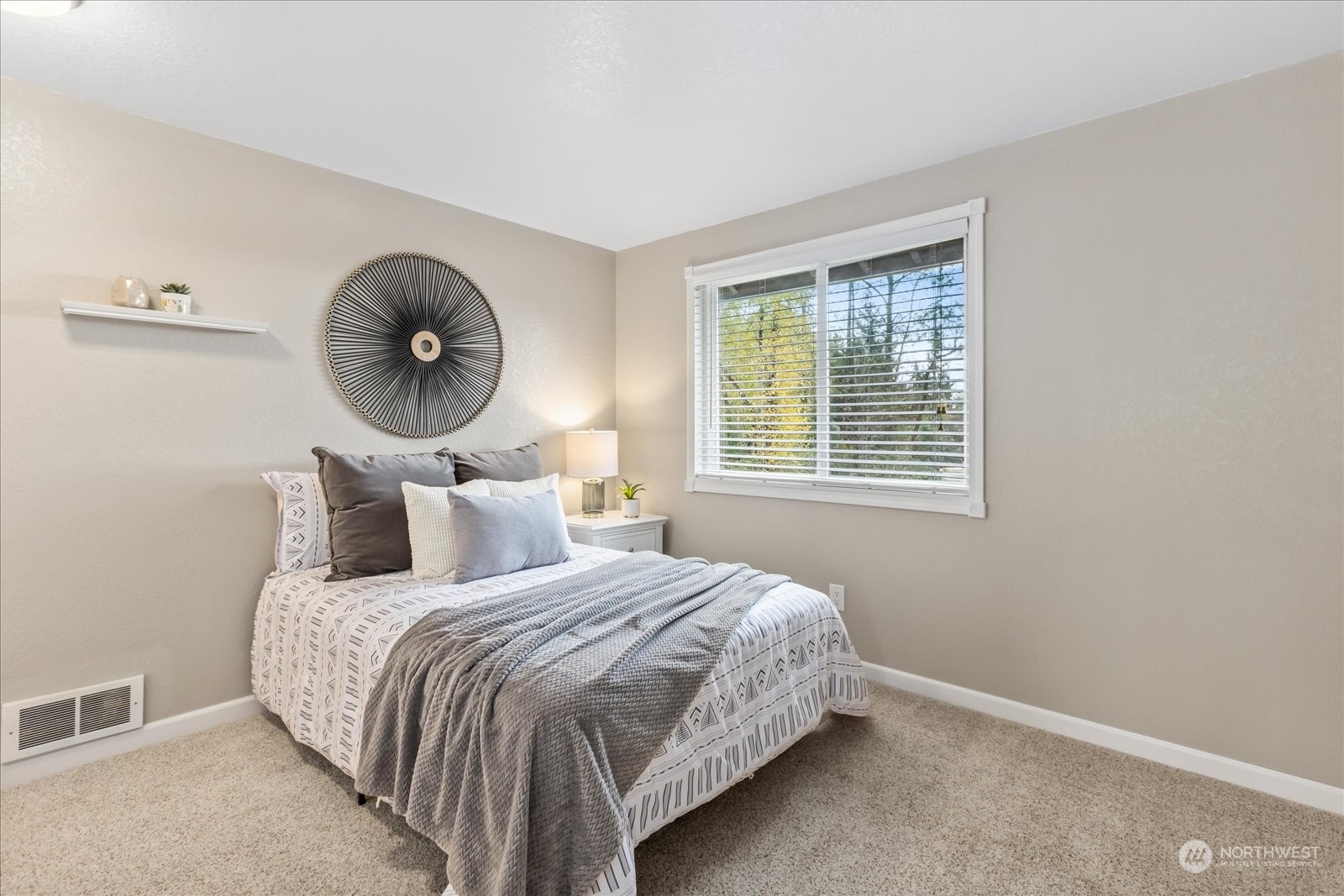 1302 224th Place Southwest Bothell, WA 98021 - Photo 23 of 32 a bedroom with a large bed and a window