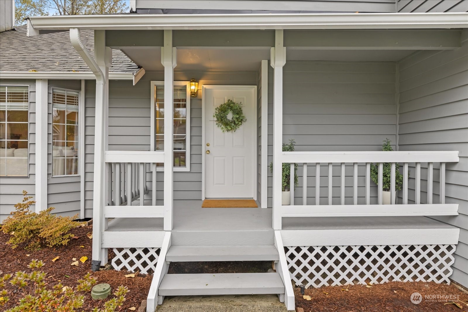 1302 224th Place Southwest Bothell, WA 98021 - Photo 3 of 32 a view of a balcony with door