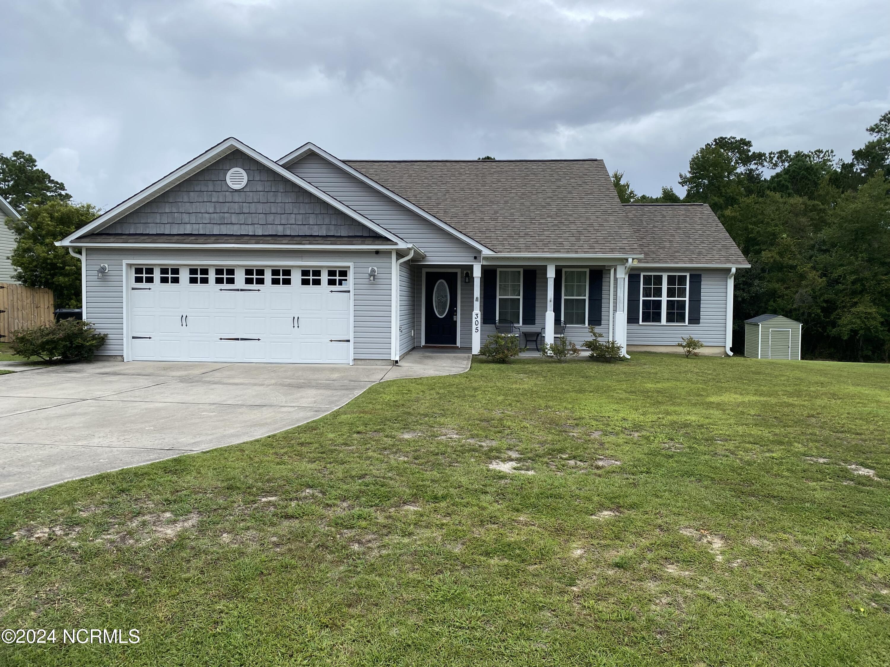 305 Crawford Street Holly Ridge, NC 28445 - Photo 1 of 15 Front