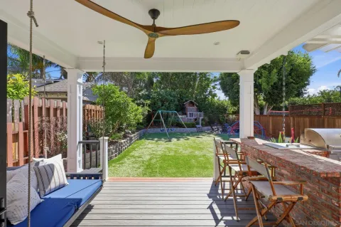 a view of a chairs and table in a patio