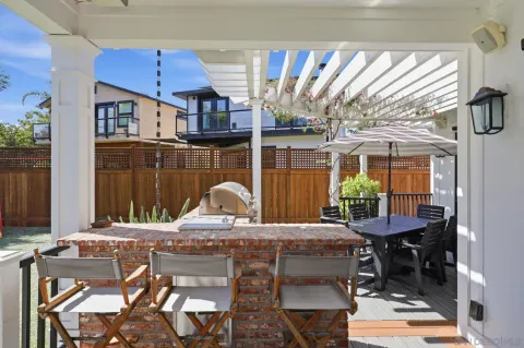 a view of a yard with furniture and a slide