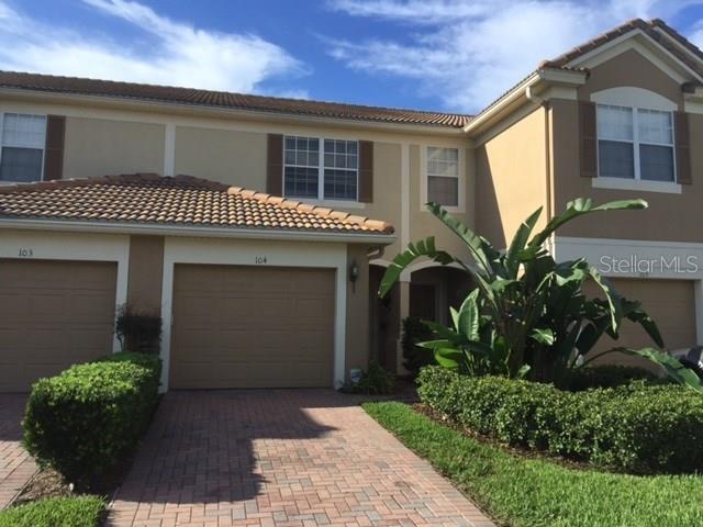 a front view of a house with a garage