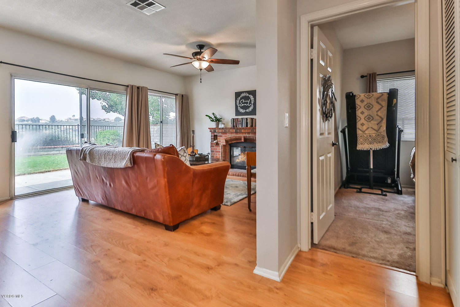 29009 Gumtree Place Saugus, CA 91390 - Photo 17 of 66 a living room with furniture and a chandelier