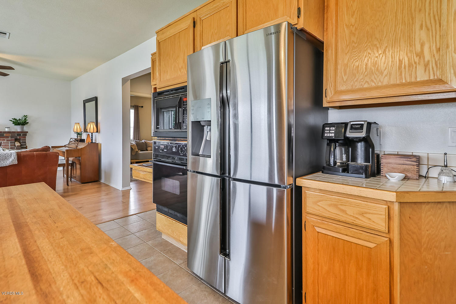29009 Gumtree Place Saugus, CA 91390 - Photo 26 of 66 a kitchen with stainless steel appliances granite countertop a refrigerator and a sink