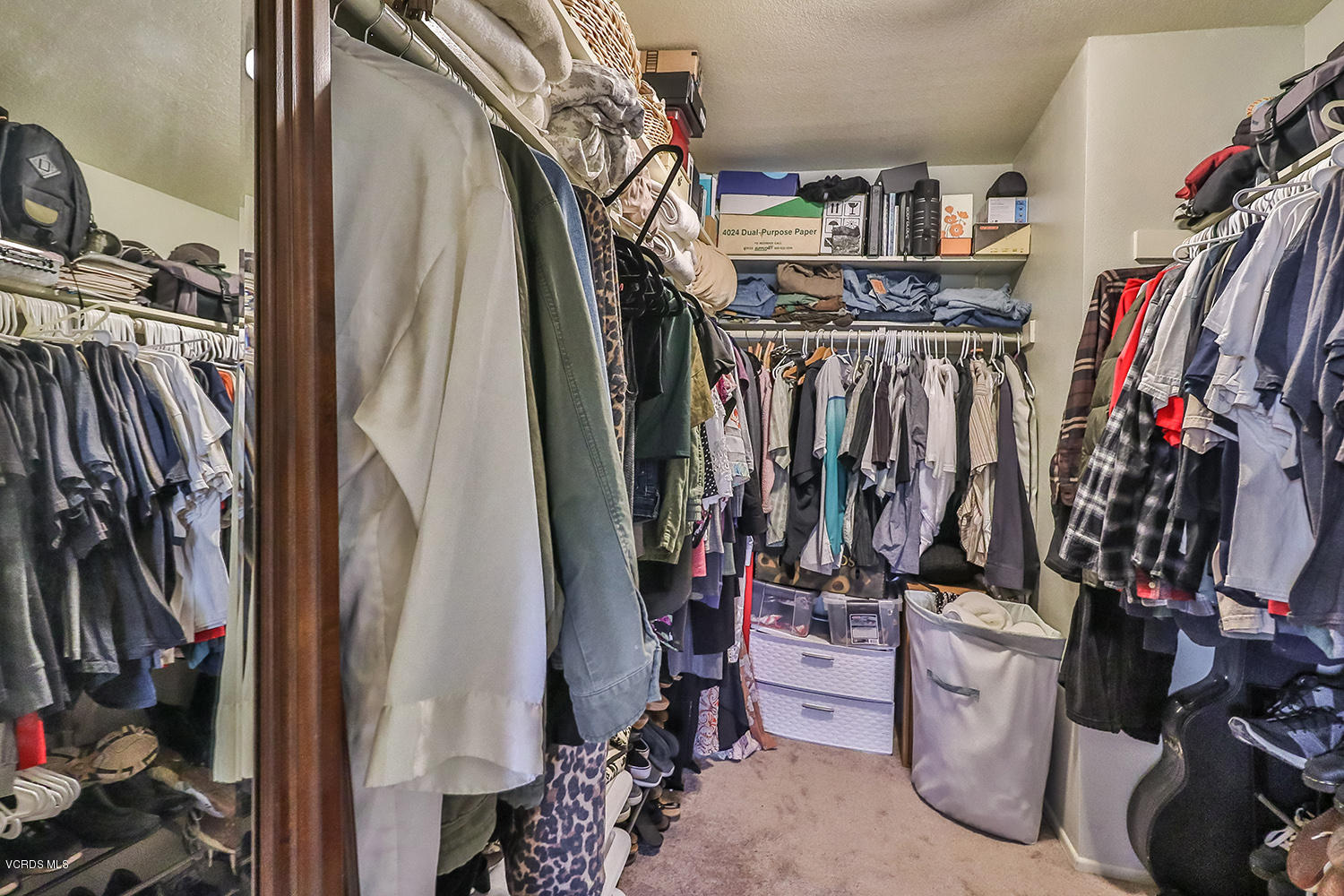 29009 Gumtree Place Saugus, CA 91390 - Photo 44 of 66 a view of walk in closet with clothes