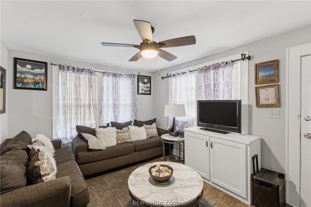 408 Hill Street Bryan, TX 77803 - Photo 23 of 50 a living room with furniture and a flat screen tv