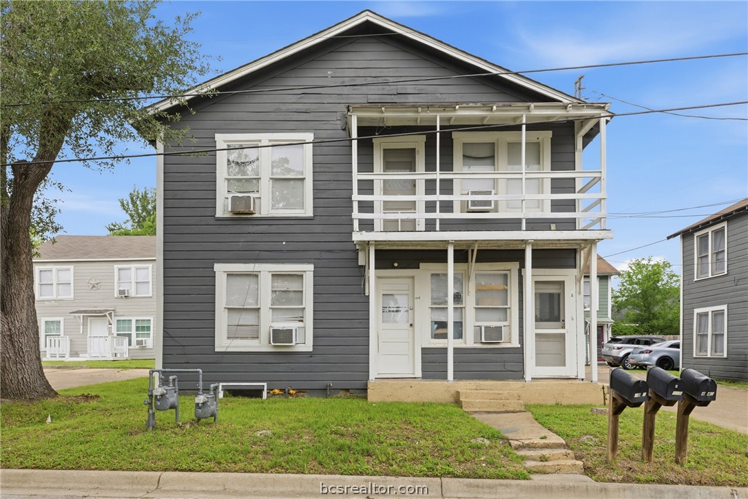 408 Hill Street Bryan, TX 77803 - Photo 5 of 50 a front view of a house with garden