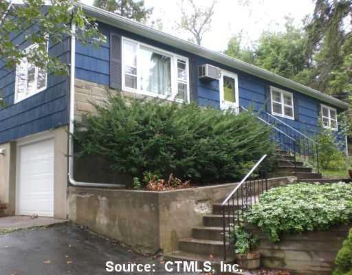 1537 Byam Road Cheshire, CT 06410 - Photo 1 of 1 a view of a house with a yard