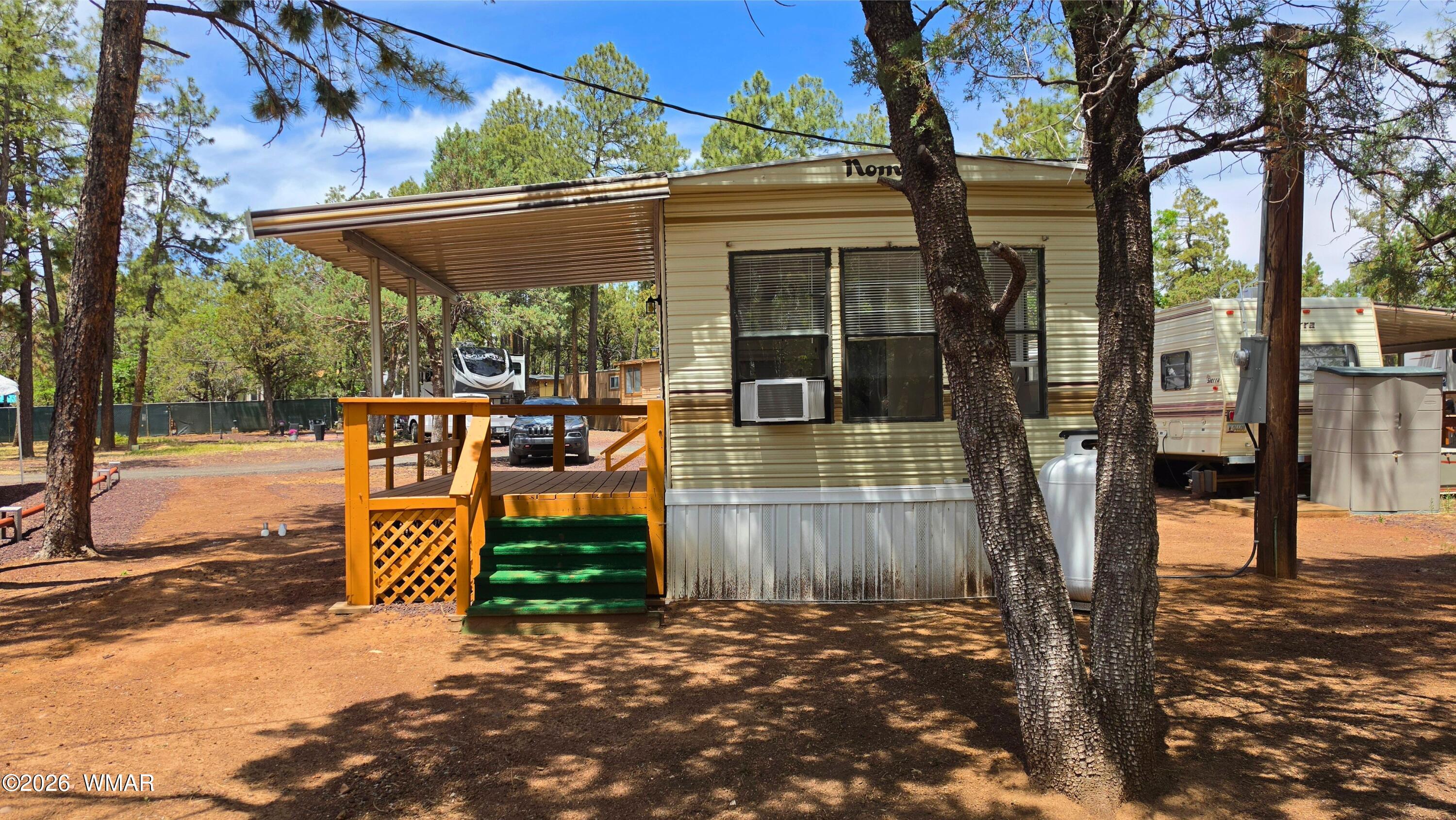 2468 Running Bear Road, Unit 44 Lakeside, AZ 85929 - Photo 2 of 11 a view of outdoor space with seating