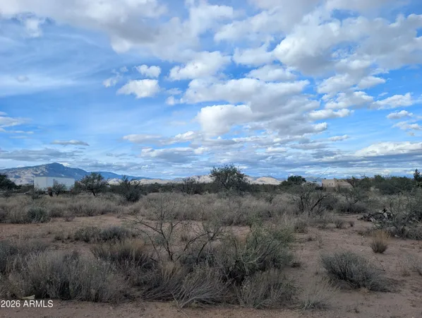 a view of city and trees