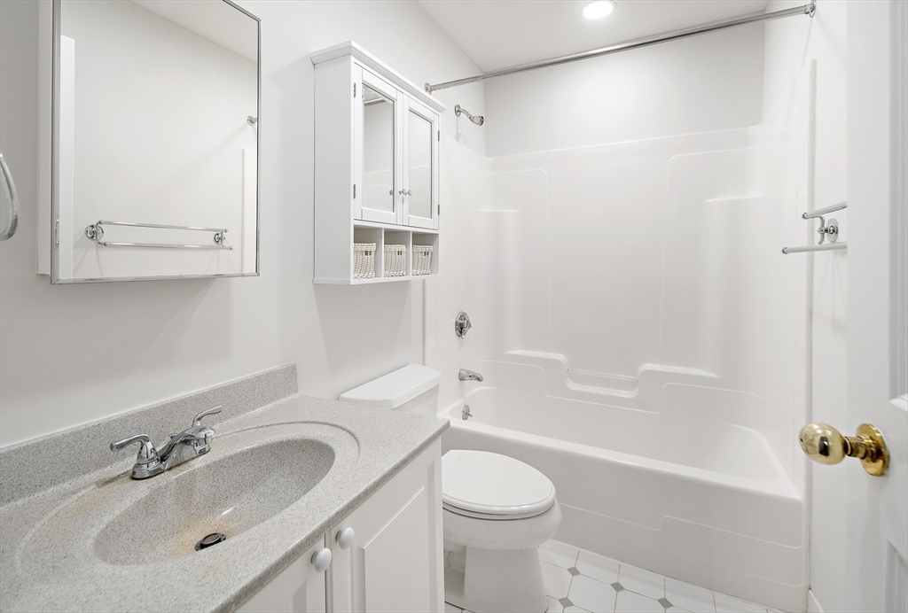 4 Charlesgate East, Unit 201 Boston, MA 02215 - Photo 15 of 30 a bathroom with a sink toilet and shower