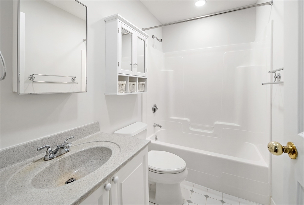 4 Charlesgate East, Unit 201 Boston, MA 02215 - Photo 15 of 32 a bathroom with a sink toilet and shower