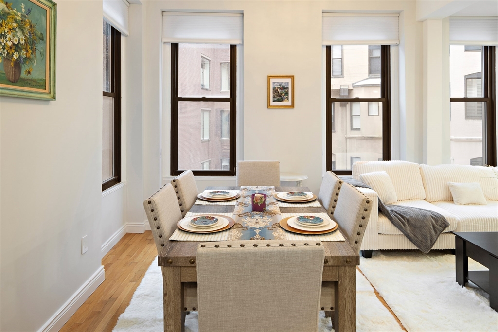 4 Charlesgate East, Unit 201 Boston, MA 02215 - Photo 3 of 30 a view of a livingroom with furniture and window
