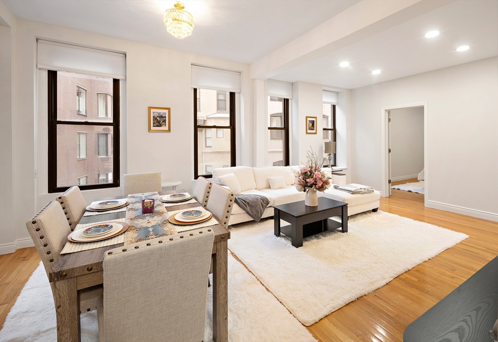 4 Charlesgate East, Unit 201 Boston, MA 02215 - Photo 5 of 30 a living room with furniture and window
